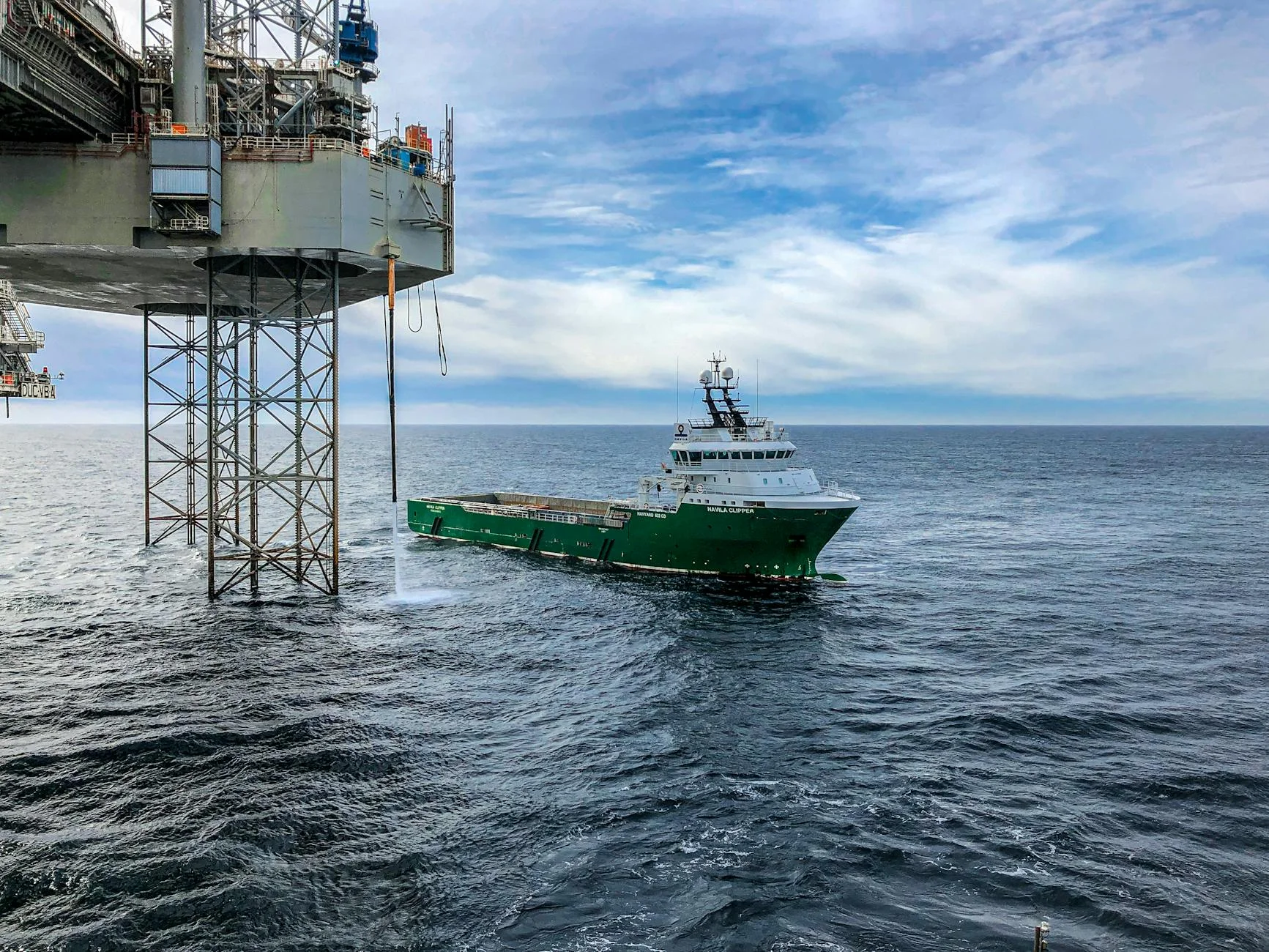 Supply vessel approaching an offshore platform, the kind of project where bid evaluation decisions turn into multi-year revenue.